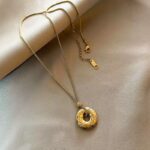 Golden Serpent Ribbed Circle Necklace